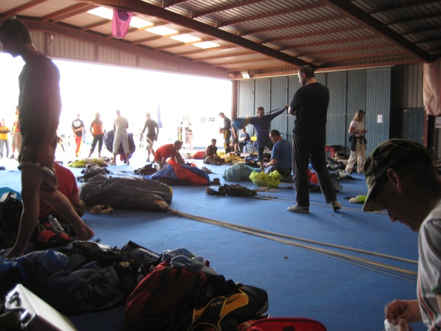 A busy packing shed during the Spanish national canopy piloting championships